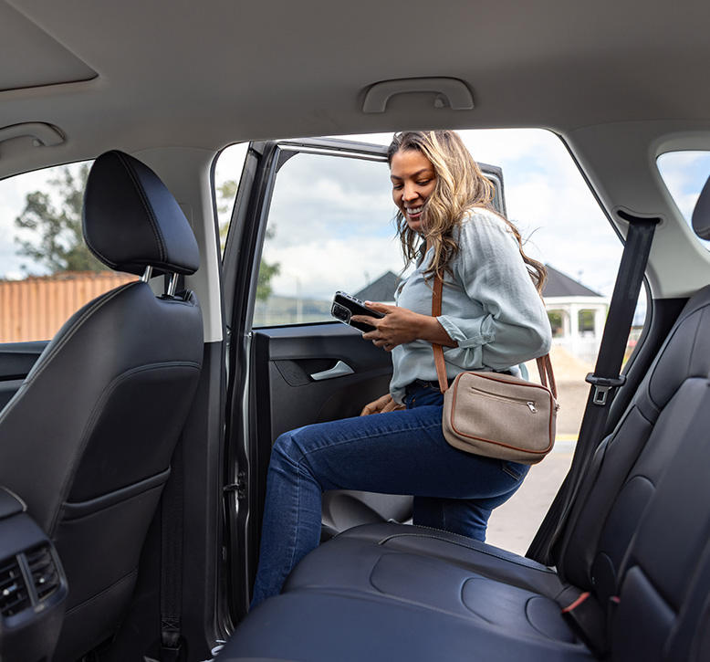 Women entering luxury shuttle